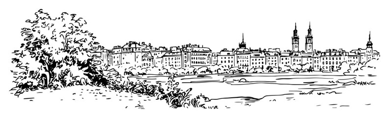 old european city view with cathedral and riverbank