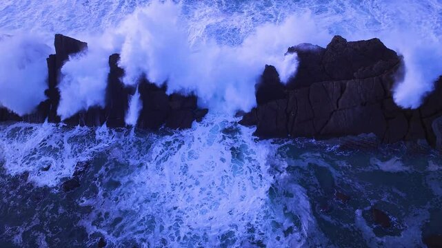 Aerial view of the sunset lights on the cliffs of Madero Beach in the Dunes of Liencres Natural Park. Pi&eacute;lagos Municipality, Costa Quebrada Geopark, Cantabrian Sea, Cantabria, Spain, Europe