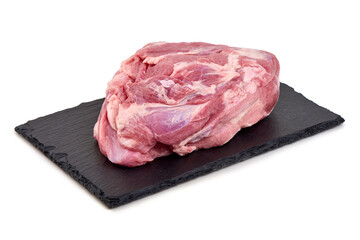Raw Pork Shoulder Cut on Slate Plate Isolated on White Background.