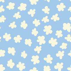 Decorative seamless vintage pattern in classic style with small flowers, ditsy. Silhouettes of flowers, Two-color ornament in pastel colors