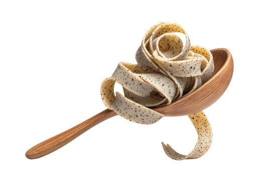 PNG Rustic wooden spoon with uncooked pasta ribbons on black background