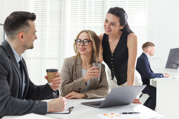 Marketing. Team of businesspeople working together at desk in office