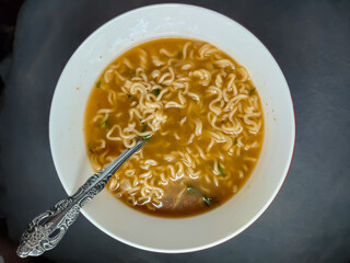 close up of a bowl of noodle soup