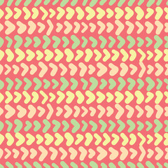 Chunky arrow repeated vector design. Doodle chevron seamless tile pattern in green, orange and yellow over red.