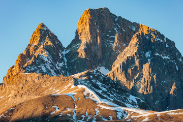 View of the Pic du Midi d'Ossau, seen from the Pourtalet Pass, at sunset, during a clear winter...
