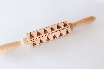 Unique wooden rolling pin with intricate patterns for baking projects and culinary creativity