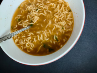 close up of a bowl of noodle soup