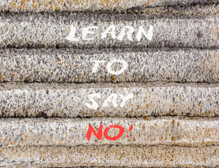 Learn to say no symbol. Concept words phrase Learn to say no on beautiful grey stone wall....