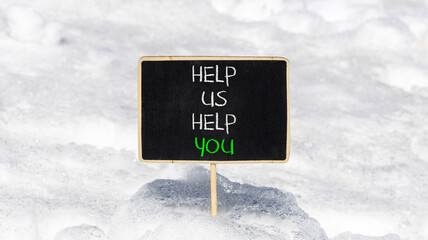 Help you symbol. Concept words phrase Help us help you on beautiful black blackboard. Beautiful...