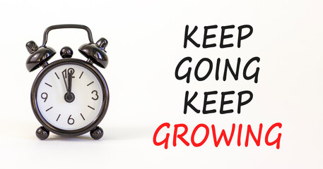 Keep going and growing symbol. Concept words phrase Keep going keep growing on beautiful white...