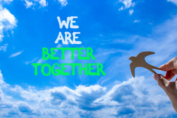 We are better together symbol. Concept words phrase We are better together on beautiful sky....