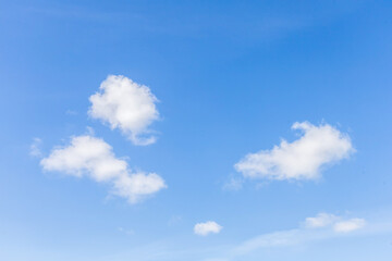 Blue sky with fluffy white clouds