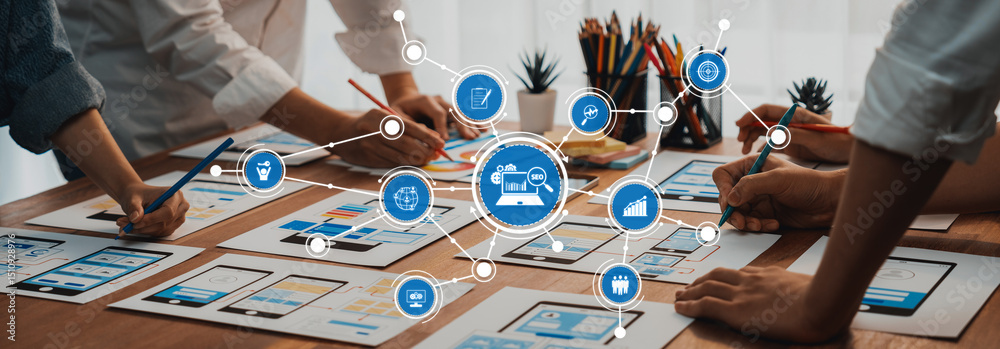 Leinwandbilder Team Collaboration on Design Mockups Featuring Mobile App Interfaces and Data Visualization Concepts. Amity