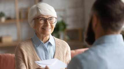 Elderly couple happily receiving social security documents in envelope, smiling with joy and relief. Retirement planning, pension benefits and senior citizen financial security concepts.