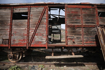Abandoned old railway wagons at station, old train wagons in an abandoned station