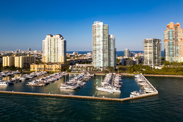 Fototapeta premium Aerial view of Miami skyline. Drone shot of Miami cityscape. Top view of South Miami and the ocean. Miami skyline.