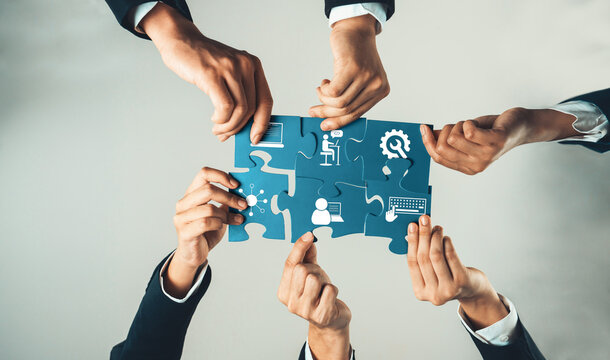 Top view panorama banner of business team assembling jigsaw puzzle over table symbolize business partnership and collective teamwork for HR recruitment and job seeker background. Shrewd Amity - Powered by Adobe