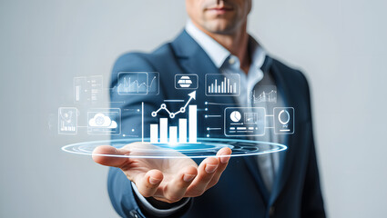 Businessman presenting digital data analytics growth charts