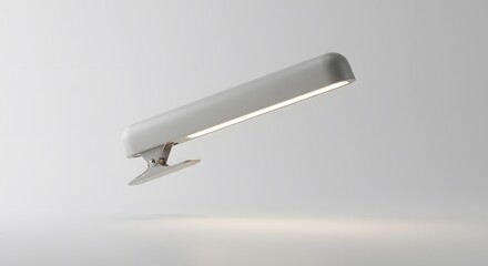 Fototapeta premium Sleek Minimalist Clip-On LED Desk Lamp: Modern Design for Efficient Illumination