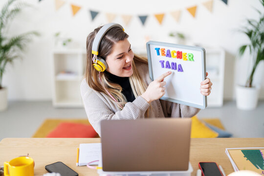 Teacher Tana is teaching online. She's using a whiteboard to help her students learn from home. It's a fun and engaging way to connect with her class..