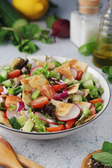 A bowl with Fattoush - Traditional Levantine salad