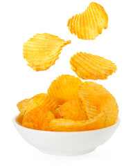 Tasty crispy potato chips falling into bowl on white background