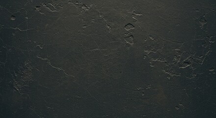 Dark gray textured surface with cracks and irregularities