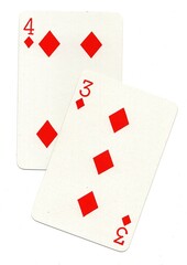 A pair of playing cards in the suit of diamonds isolated on a white background.