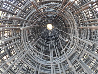 Mesh wire rolls construction material.Net wire mesh roll in construction area.Construction iron wire