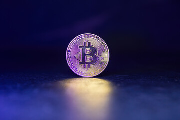Bitcoin with Golden Glow Reflected on Surface