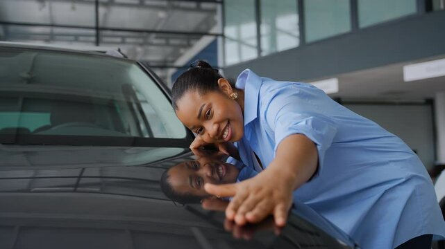 Woman choosing her new car at dealership