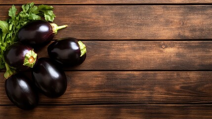 A bunch of fresh, glossy eggplants is beautifully placed on a rustic wooden table, highlighting their vibrant color and inviting texture for healthy culinary uses.