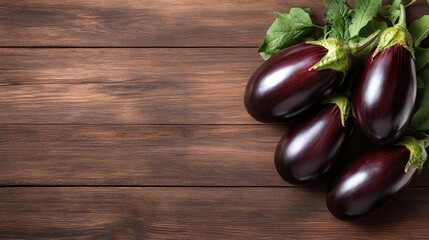 An artistic display of fresh eggplants, with their rich purple hue, set against a warm wooden background, adding a touch of elegance to food photography.