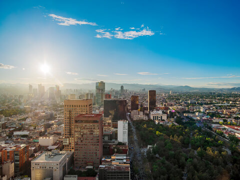 View over Alameda Central towards High-rise buildings of Paseo de la Reforma at sunset, Mexico City, Mexico
