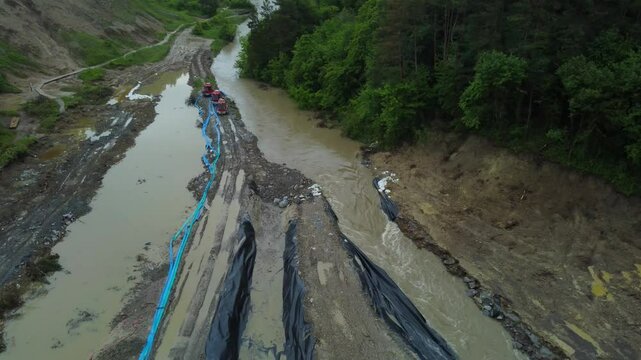 The place where the Corund stream floods the salt mine in Praid - Romania, as a result of soil erosion