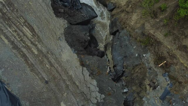 The place where the Corund stream floods the salt mine in Praid - Romania, as a result of soil erosion