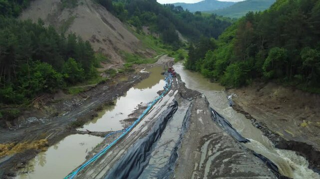 The place where the Corund stream floods the salt mine in Praid - Romania, as a result of soil erosion