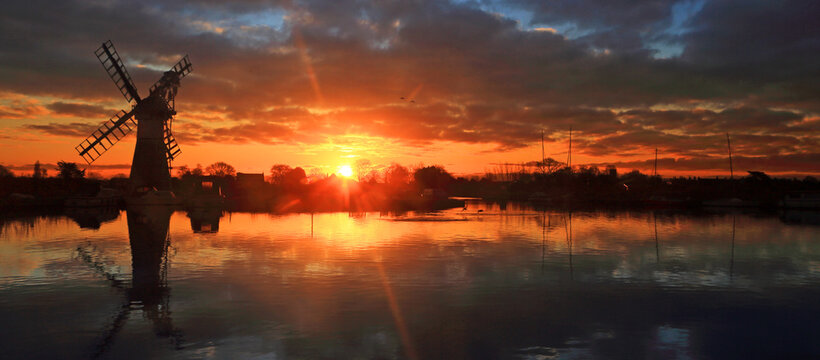 Thurne Mill and river Thurne, sunrise, Norfolk Broads