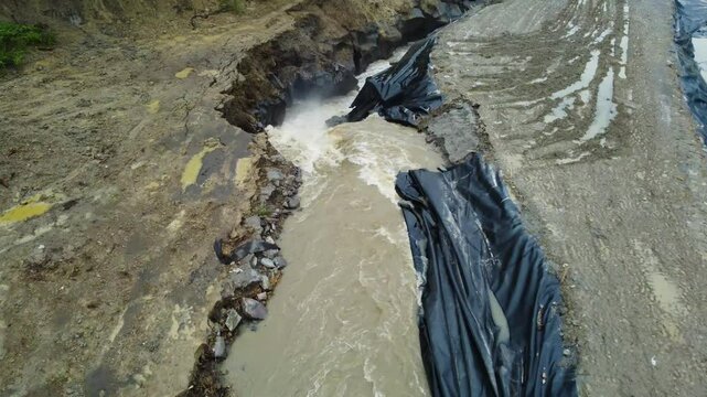 The place where the Corund stream floods the salt mine in Praid - Romania, as a result of soil erosion