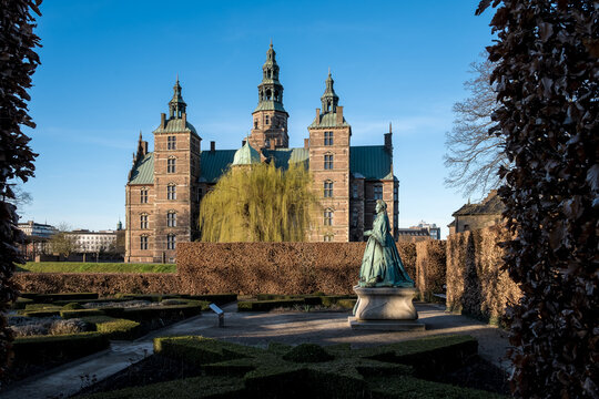 View of Queen Caroline Amalie's statue by Vilhelm Bissen in Kongens Have, the city's oldest royal garden, offering a peaceful green retreat in the heart of the capital.