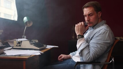 Thoughtful writer in smoky vintage study, cinematic composition with soft-focus on typewriter and...