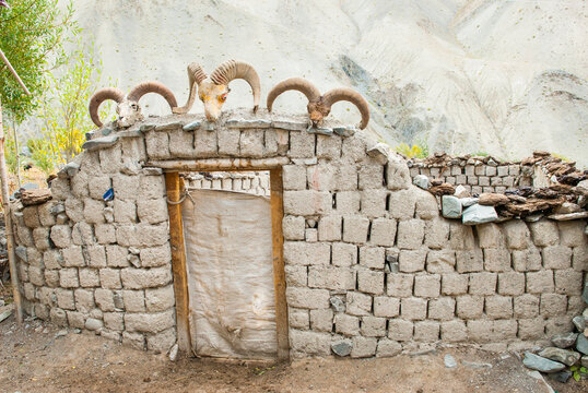 Brick enclosures of dried earth for cattle, goats, Rumbak village, Hemis National Park, Ladakh region, state of Jammu and Kashmir, India, Asia