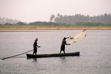 Canoe net fishermen on Mono River mouth in Grand-Popo area, Benin, Gulf of Guinea