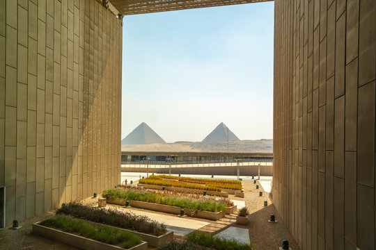 View of Giza Pyramids from the interior of the Grand Egyptian Museum (GEM), Cairo, Egypt, Africa