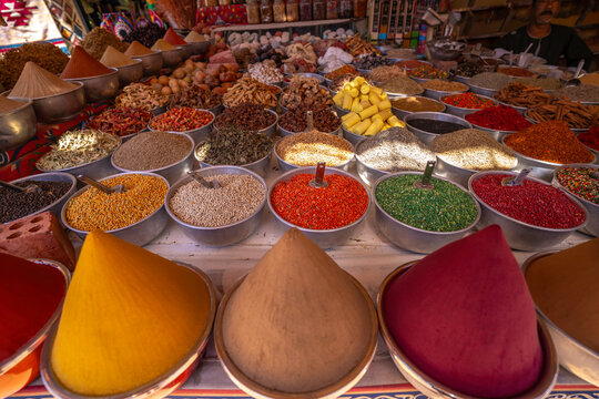 View of colourful spices on market stalls at Nagaa Suhayl Gharb on the Nile river near Aswan, Aswan, Nubia, Egypt, North Africa, Africa