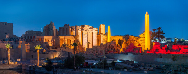 View of Karnak Temple sound and light show at dusk, Luxor, Egypt, Africa