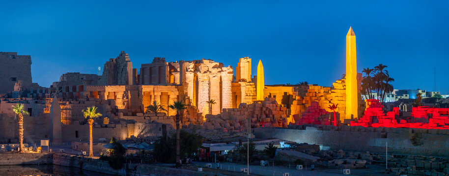 View of Karnak Temple sound and light show at dusk, Luxor, Egypt, Africa