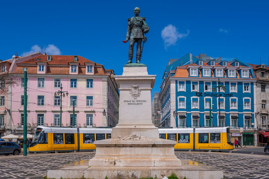 View of Duke of Terceira statue and a modern tram in PC Duque da Terceira on a sunny day, Lisbon, Portugal, Europe
