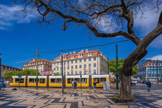 View of a modern tram in PC Duque da Terceira on a sunny day, Lisbon, Portugal, Europe