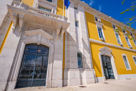 View of yellow and stone architecture of the Ministry of Finances on a sunny day, Lisbon, Portugal, Europe